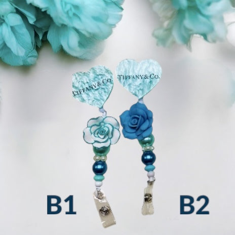 DesignerBadge Reel & Pop Sockets